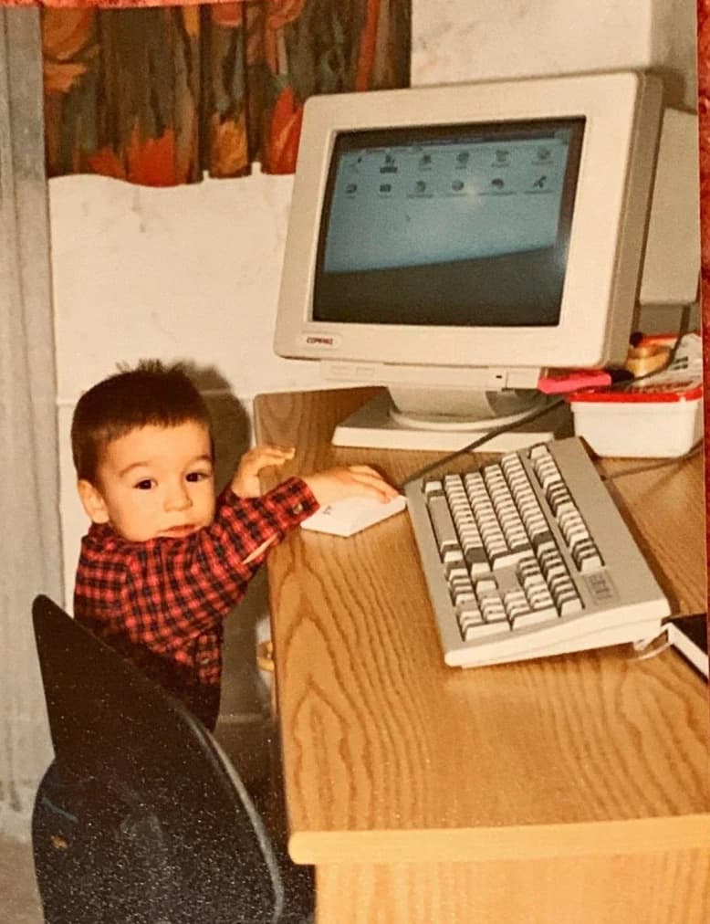 Thomas Gal as a toddler at a computer